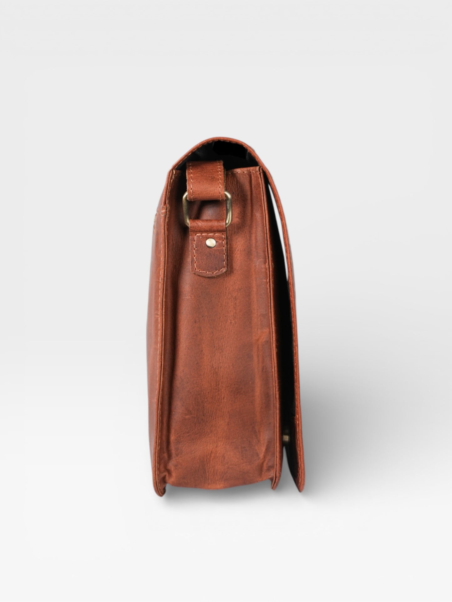 Brown leather briefcase on a light gray background